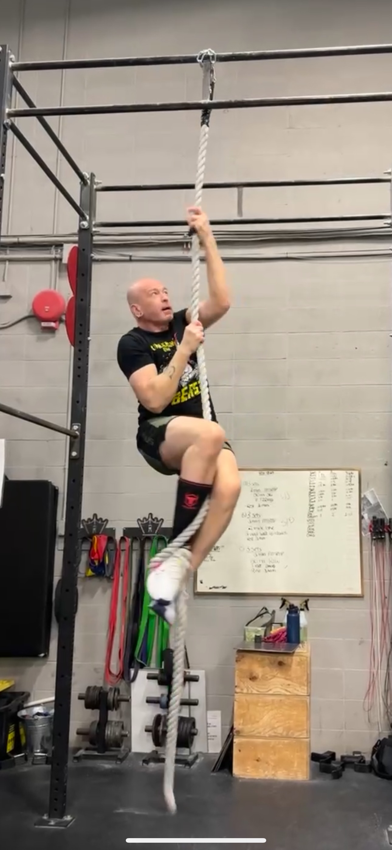 Chris climbing rope after weight loss transformation